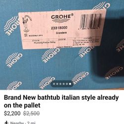 Brand new tub.... Along With tub filler 