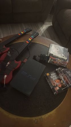 PS2 with games and Guitars