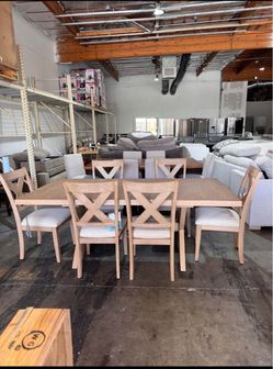 8 dining table sets all new from Costco