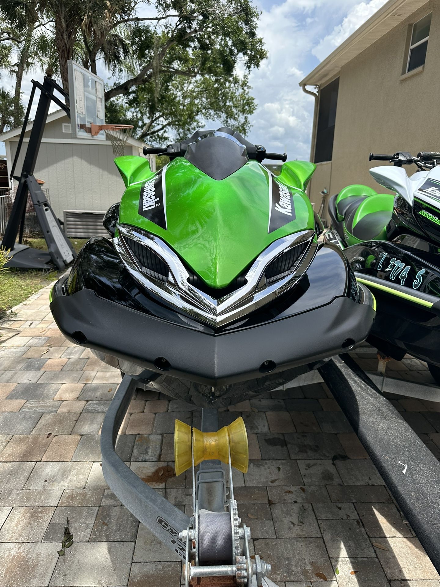 2- 2018 Kawasaki jet skis with dual trailer and landing mats