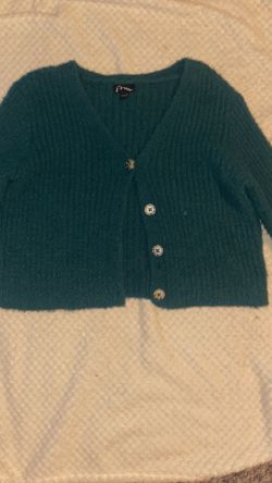 Green sweater/ size: large