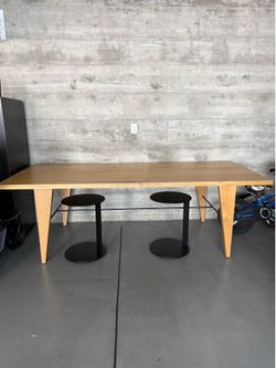 CB2 solid oak dining table