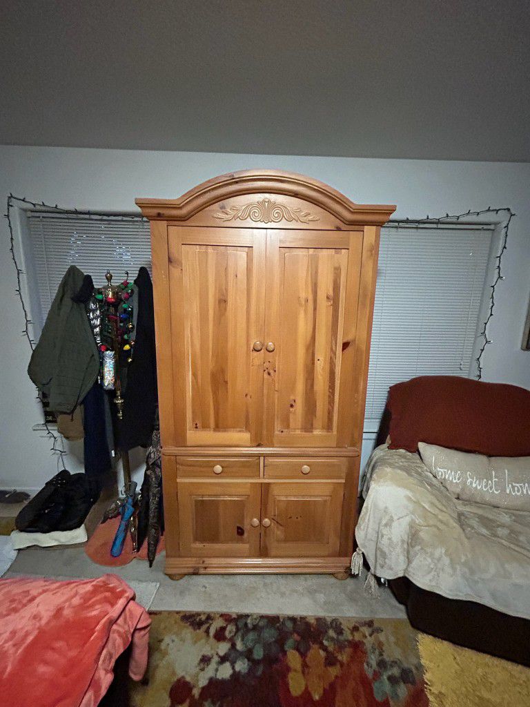 FREE- MUST GO TODAY!Wood Entertainment Center/Armoir