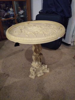 Carved table and vase made in Italy