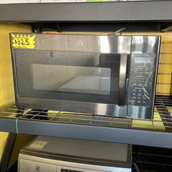 New GE Over The Range Microwave