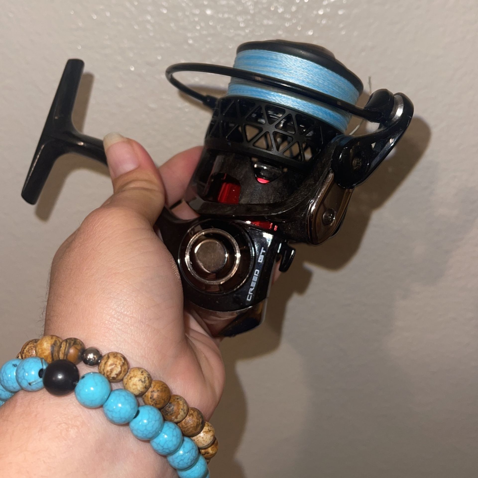 CREED GT SPINNING REEL WITH BRAIDED LINE