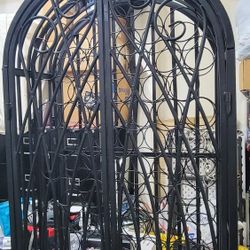LARGE 100 BOTTLE BLACK METAL WINE CABINET. LIKE NEW.