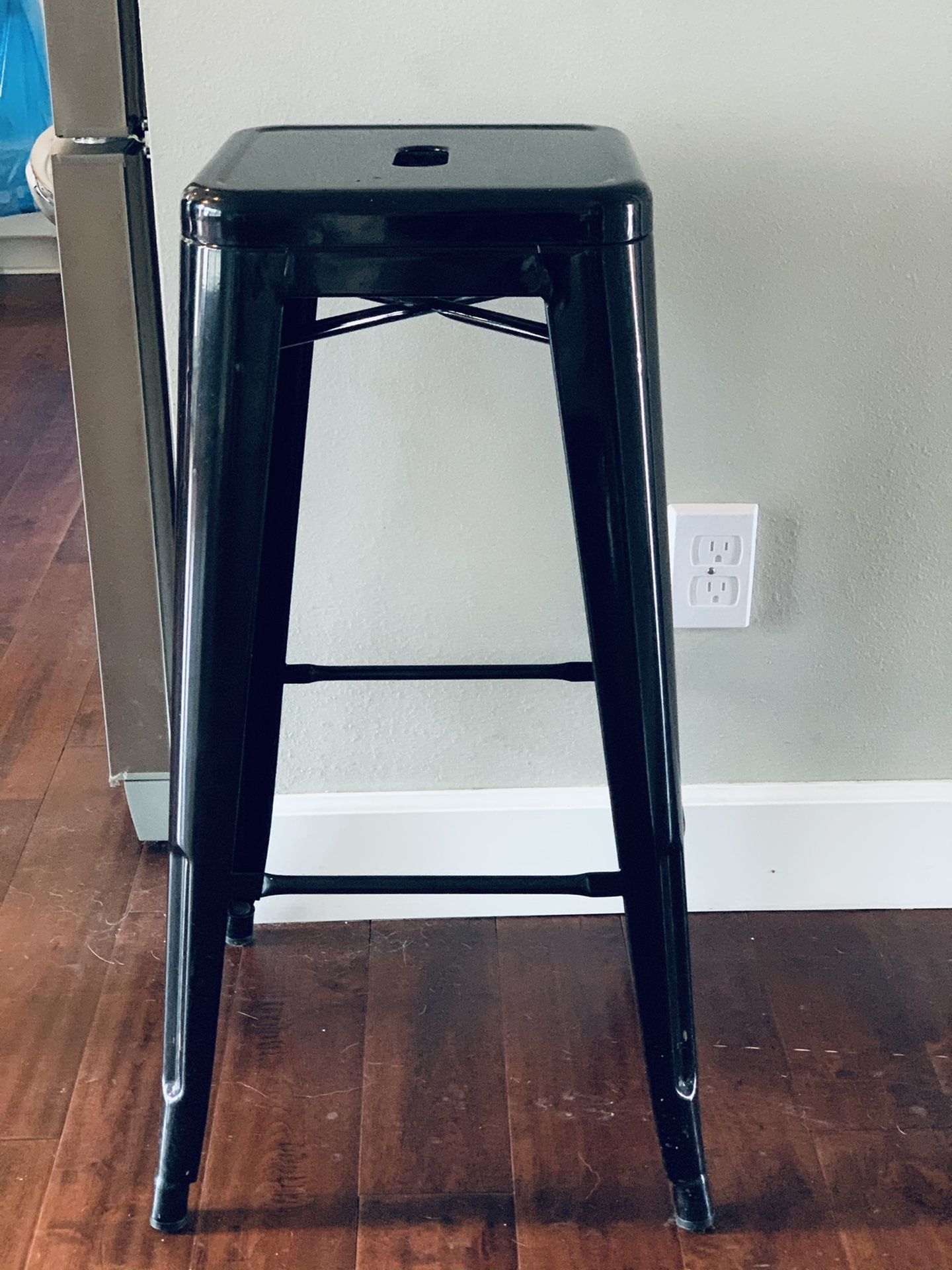 Black metal stool