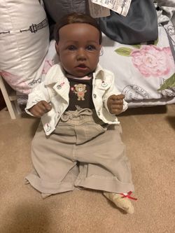 Two non-silicone baby dolls