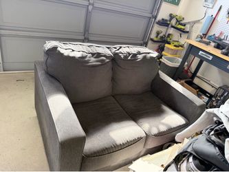 Grey love seat