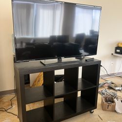TV And Stand With Shelves And Wheels