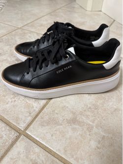 Woman’s 8.5 Cole Haan leather tennis shoe