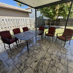 Outdoor used patio table with 6 chairs