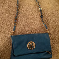 Tory Burch electric blue clutch with strap