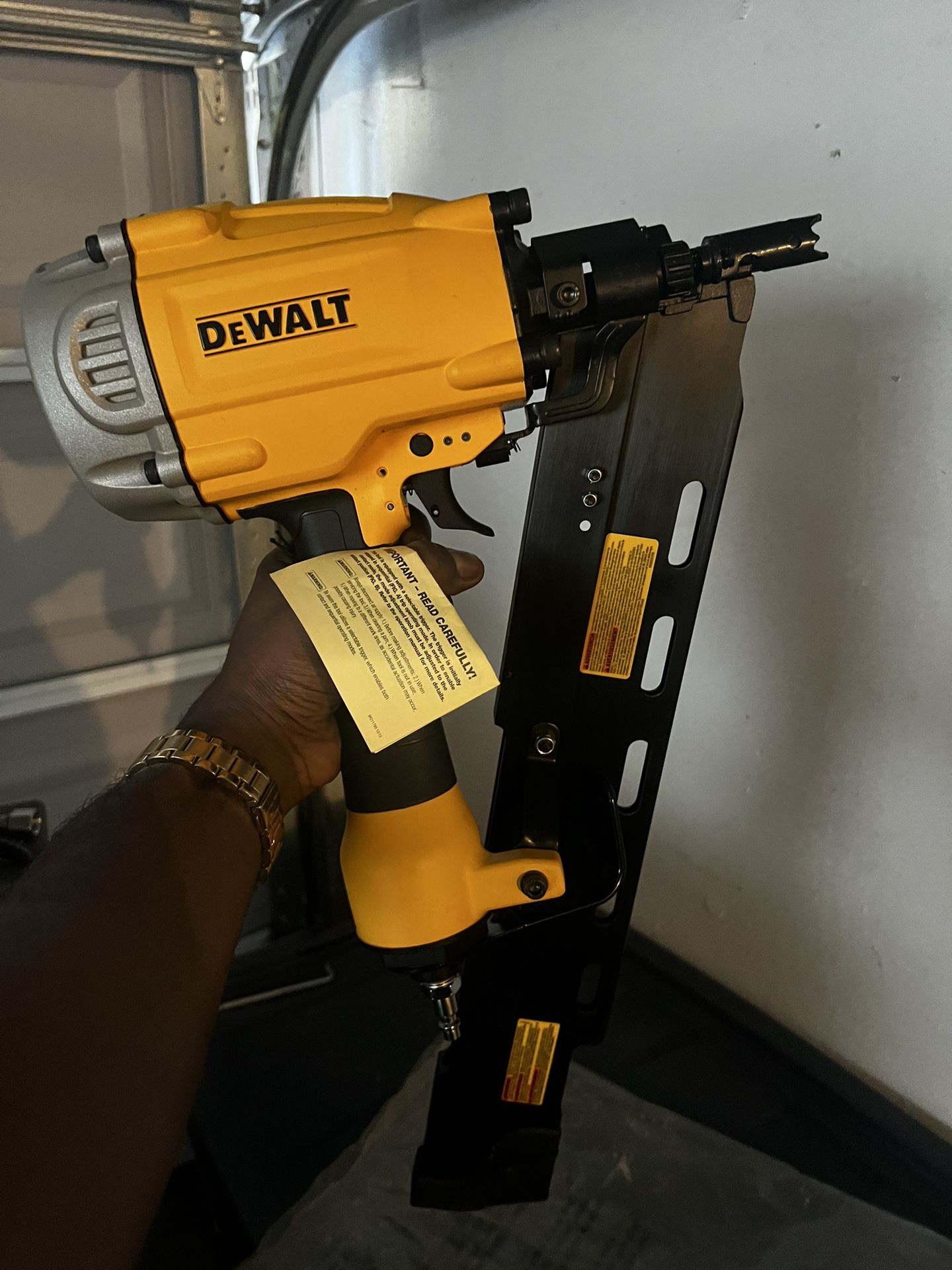 Yellow And Black Dewalt Nail Gun