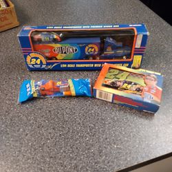GORDON   1995. HAULER IN BOX.  2 SETS PLAYING CARDS. AND PEZ DISPENSERS. 
