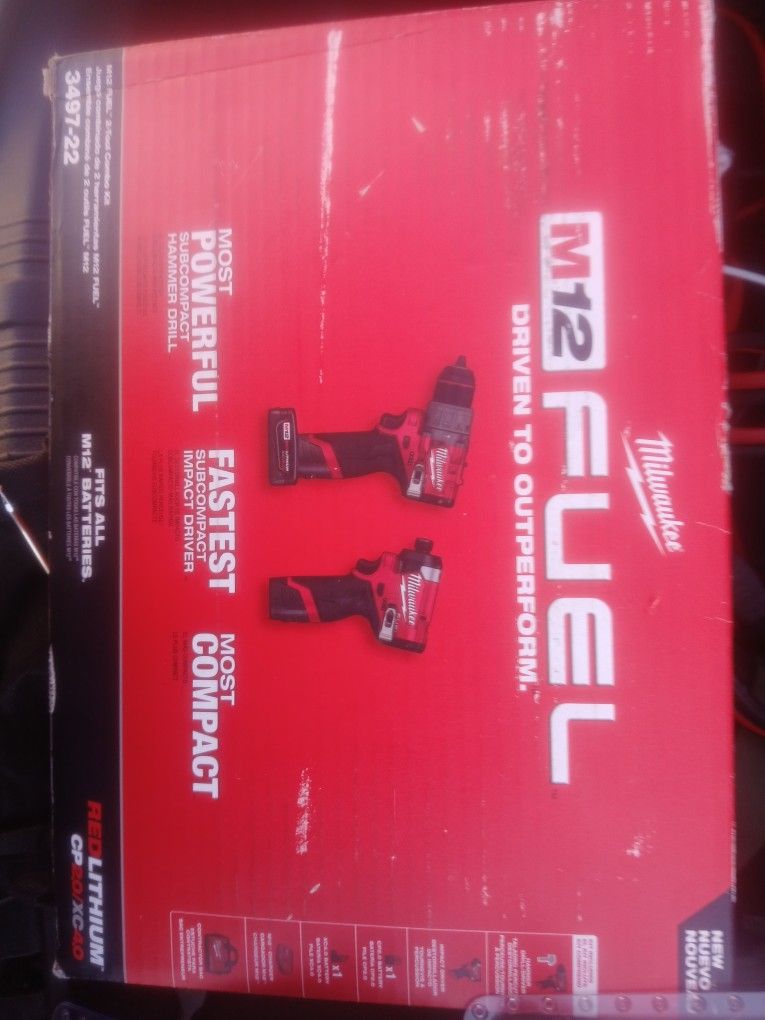 Millwaukee M12 Fuel 2 Tool Combo Kit 3497-22 And Two, Two Packs Of M12 Batteries. All Brand New.