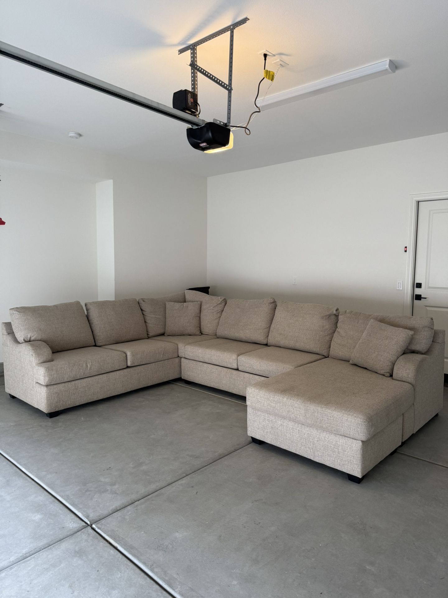 Living Spaces Couch - Esteban Beige Fabric 138" 2 Piece U-Shaped Sectional with Right Arm Facing Sofa Chaise