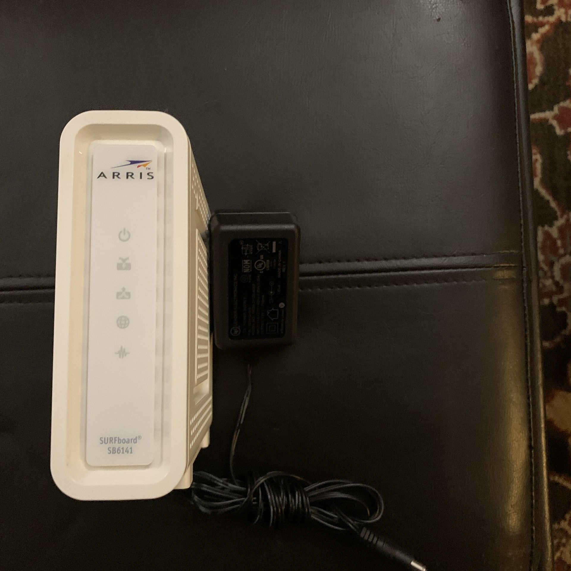 ARRIS SURFBOARD SB6141 DOCSIS 3.0 Cable Modem and power adapter