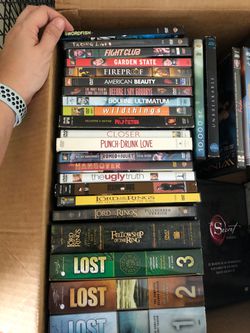 30 Miscellaneous DVD’s ( 3 seasons of Lost & Lord of the rings )