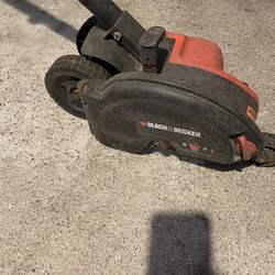 Electric Lawn Edger and Gas Lawn Mower