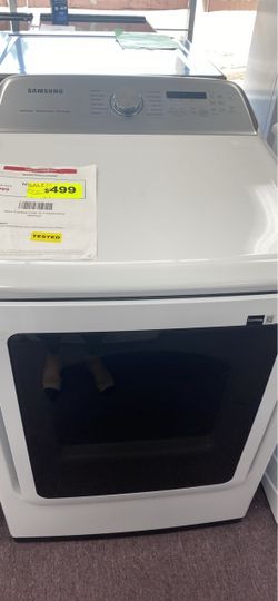 Tested Samsung DVE52A5500W electric dryer is white with a front-loading design. It has a steam cycle, moisture sensor, and SmartThings connectivity. T