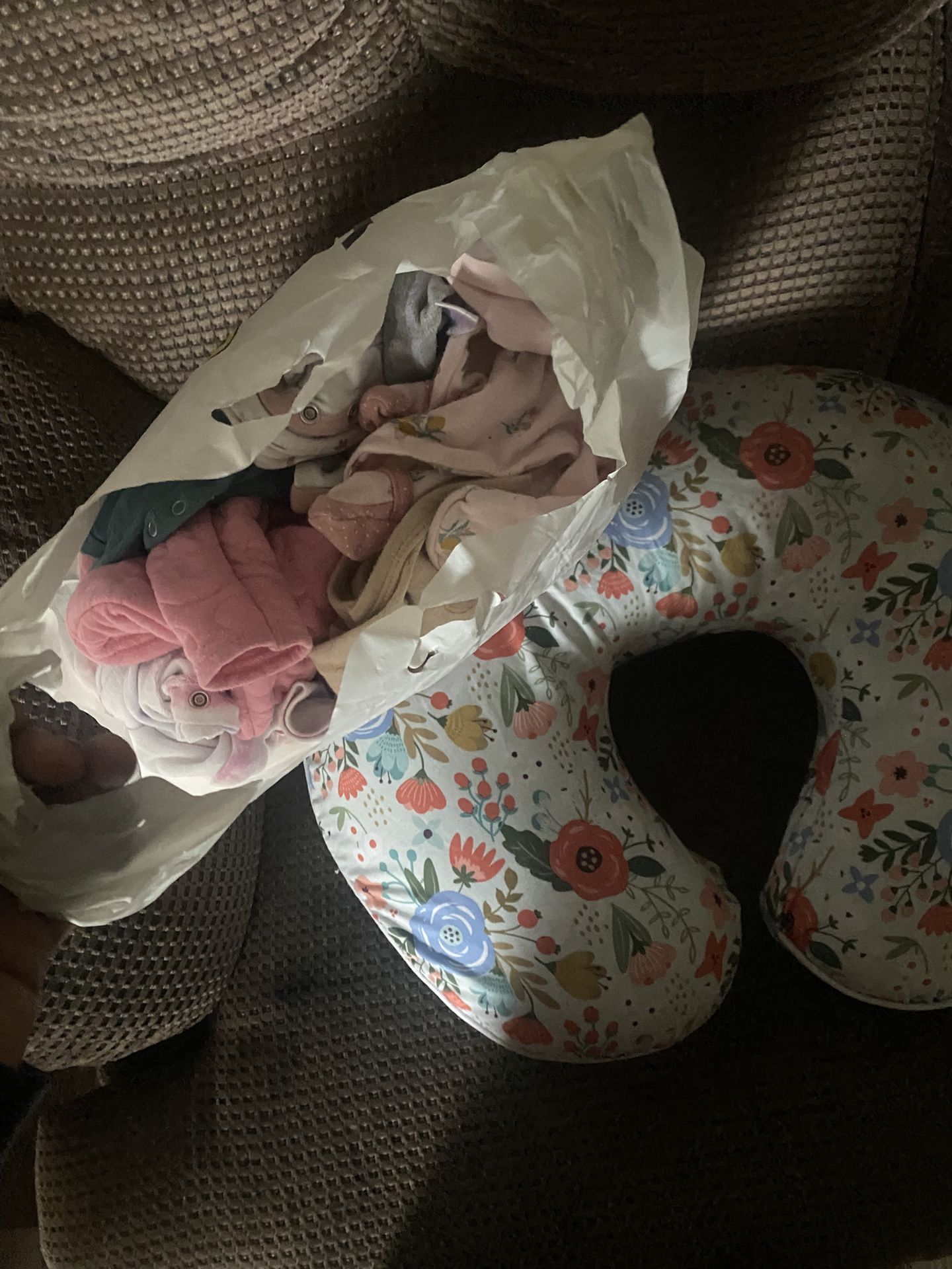 baby girl clothes and nursing pillow