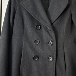 It’s A Beautiful Jacket From Michael Kors. The Color Is Dark Gray. The Size Is Medium. It’s Double Breast Barely Used.