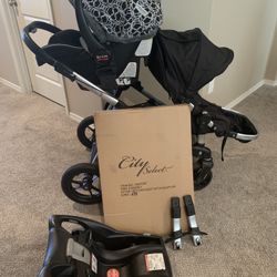 City select stroller With two seats, car seat with base and adapters.