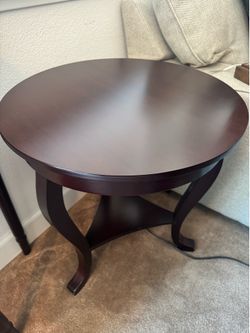 Round Dark Wood End Table with Lower Shelf