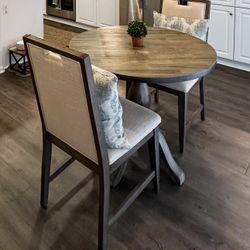 World Market dining table + upholstered  chairs