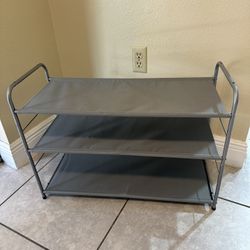 Three Level Shoe Rack 16 Inches High,27 Inches Wide And 11 Inches Long.