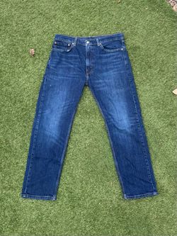Levi's 505 Regular Fit Jeans feature a timeless straight-leg