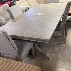 Table and four chairs brand new 1199 grab and go