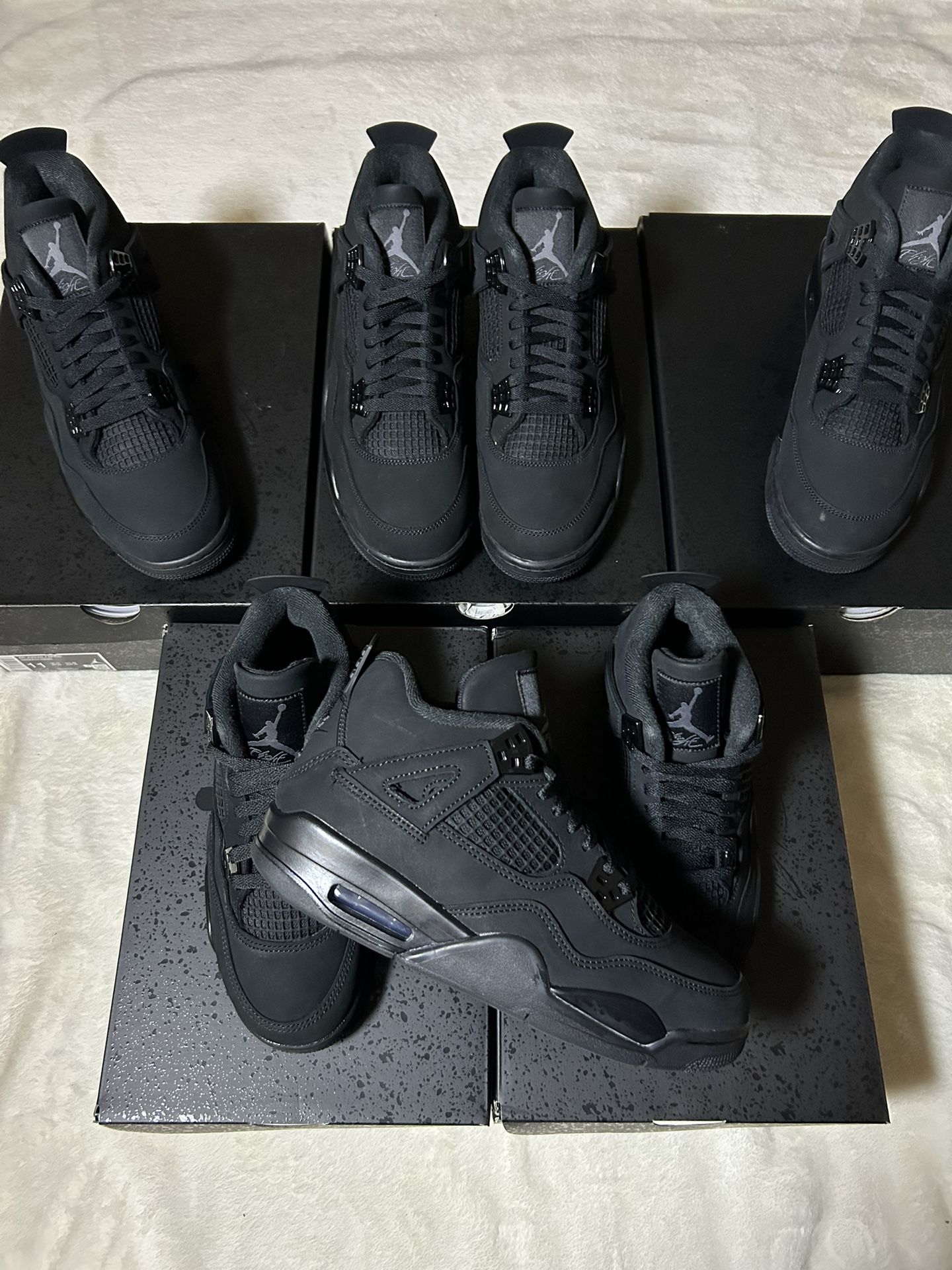 Black Cat Jordan 4’s 