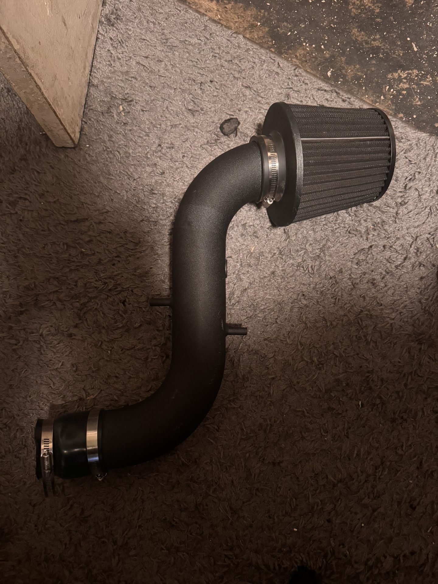 universal cold air intake system with a cone filter