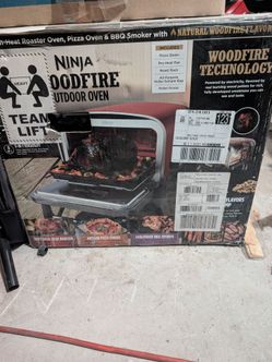 Brand new in box Ninja 8 in 1 wood fire pizza oven