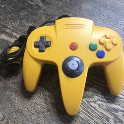 Authentic Nintendo 64 OEM yellow controller with tight stick