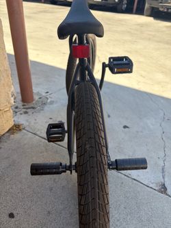 Black BMX Bike with Pegs