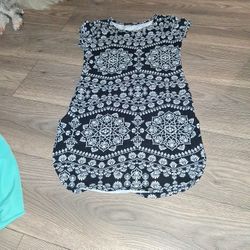 Size Small Abierto Alos Lados.