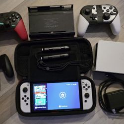 Nintendo Switch OLED Model HEG  001 – 64GB Console + 512 SD + 2 Pro Controllers