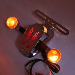 Metal Flame Fire Rear Brake Tail light Turn Signal For Harley Cafe Racer Bobber PN:XH3118B-C-01-CD-SK