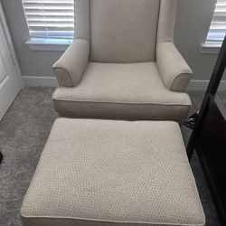 Cream Colored Chair And Footrest 