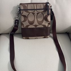Tan and brown coach purse
