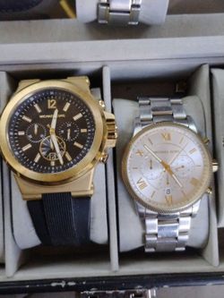 Mans Michael kors watches great condition Both $150