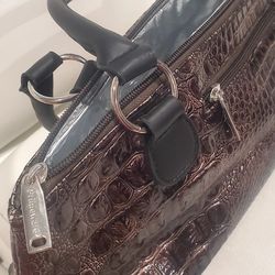 Primeware insulated wine clutch with a brown alligator print 