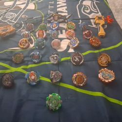 26 Beyblades And 4 Lanchers!