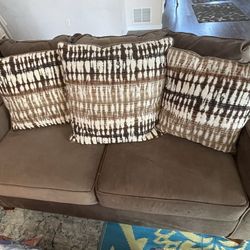 Value City brown upholstered sofa and love seat