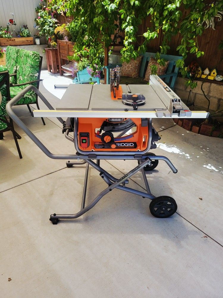 Ridgid (slightly used)15 Amp 10 in. Portable Corded Pro Jobsite Table Saw with Stand