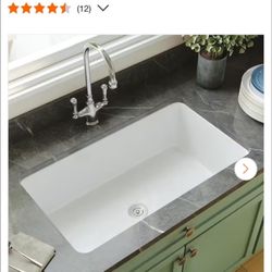 Sink With Basket Strainer And Sink Grid